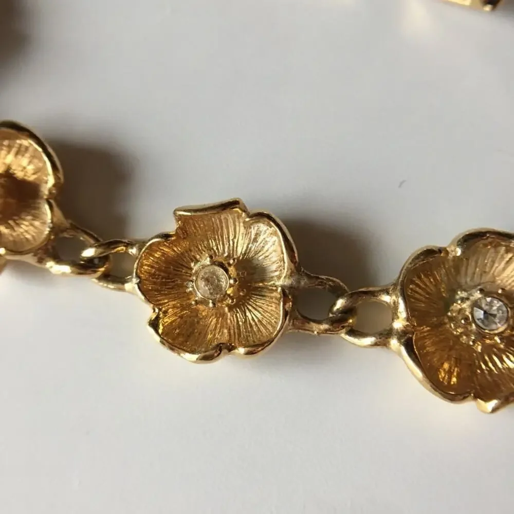 Vintage gold tone flower chain necklace with rhinestone accents